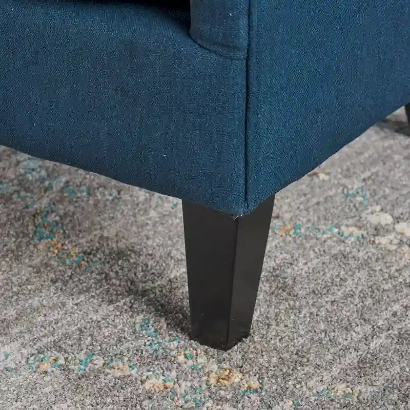 Fauteuil club contemporain en tissu à dossier haut