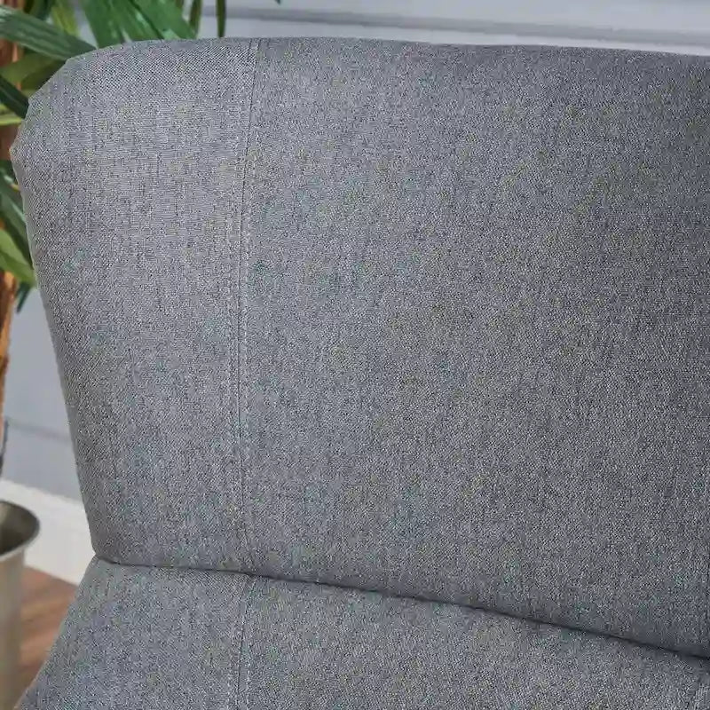 Fauteuil club contemporain en tissu à dossier haut