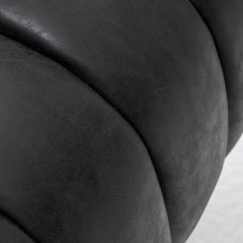 Fauteuil pivotant rond rembourré en cuir synthétique de style Mid-Century