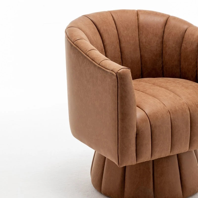 Fauteuil pivotant rond rembourré en cuir synthétique de style Mid-Century