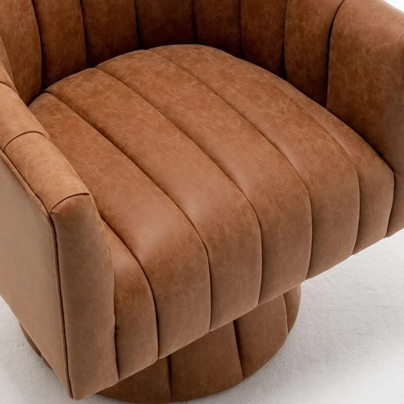 Fauteuil pivotant rond rembourré en cuir synthétique de style Mid-Century