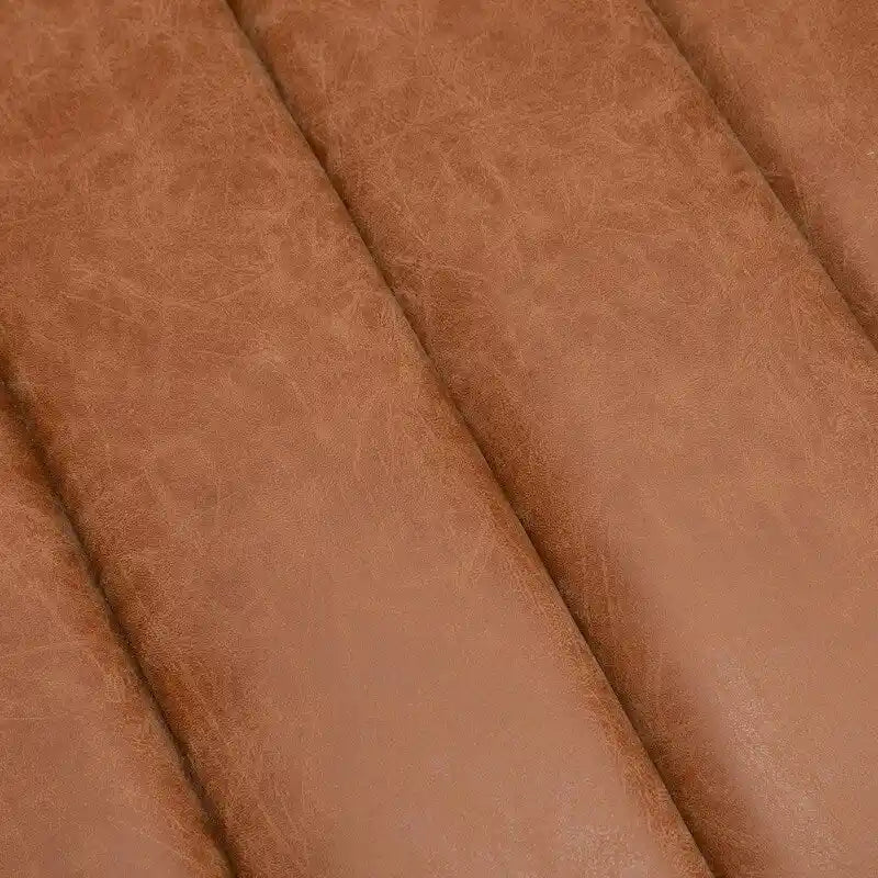 Fauteuil pivotant rond rembourré en cuir synthétique de style Mid-Century