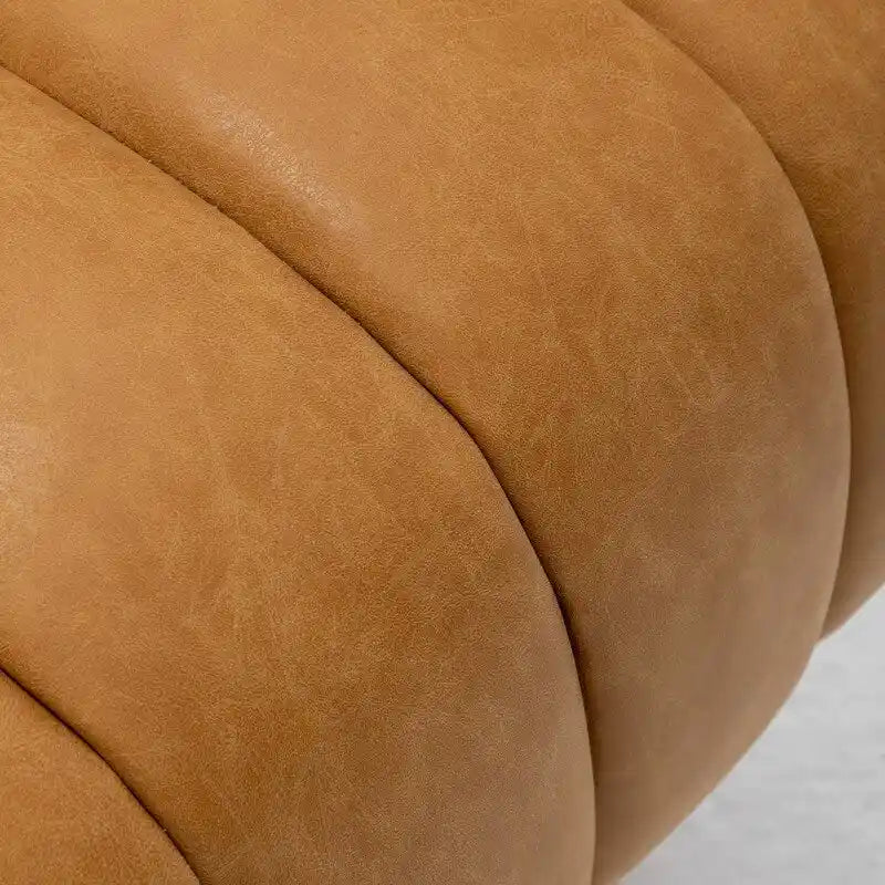 Fauteuil pivotant rond rembourré en cuir synthétique de style Mid-Century